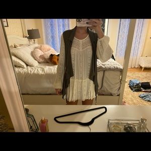 Green vest/ white dress/ or top